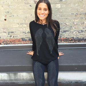 ANGELIC NYC black crewneck with black wings.
