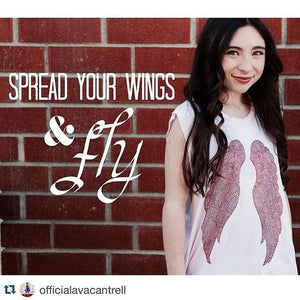 Ava Cantrell (actress) in our Sweetheart Tank! It's a baby pink tank top with red wings on the front! 