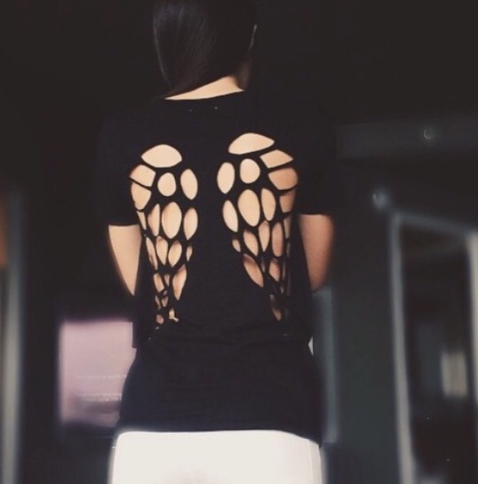 Picture of Cut To A Tee Black Shirt. It is a V-neck with laser cut angel wings on the back.